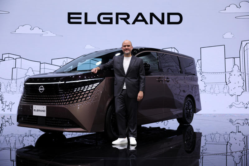 Nissan's CEO Ivan Espinosa poses for a photo in front of the new Nissan Elgrand during its unveiling, at a press day of the Japan Mobility Show 2025 at Tokyo Big Sight in Tokyo, Japan, on Wednesday. (Photo: Reuters)
