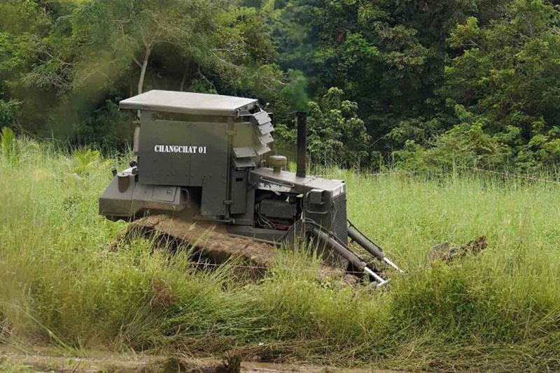 The Thai army deploys an armoured bulldozer to search for unexploded ordnance in Ban Nong Ya Kaeo in eastern Sa Kaeo province last month. (Photo: Army Military Forces Facebook page)