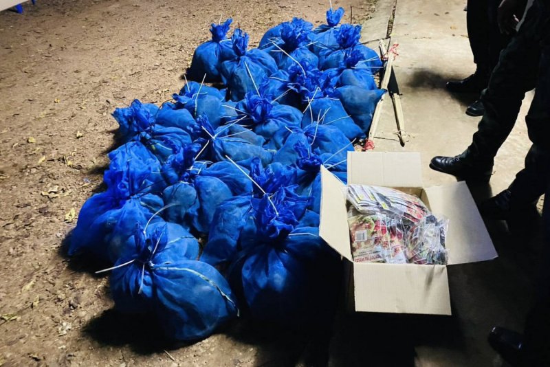 Rangers in Sa Kaeo seize mesh bags containing crab-eating macaques, intended to be smuggled out of Thailand on Friday. (Photo: Department of National Parks, Wildlife and Plant Conservation)