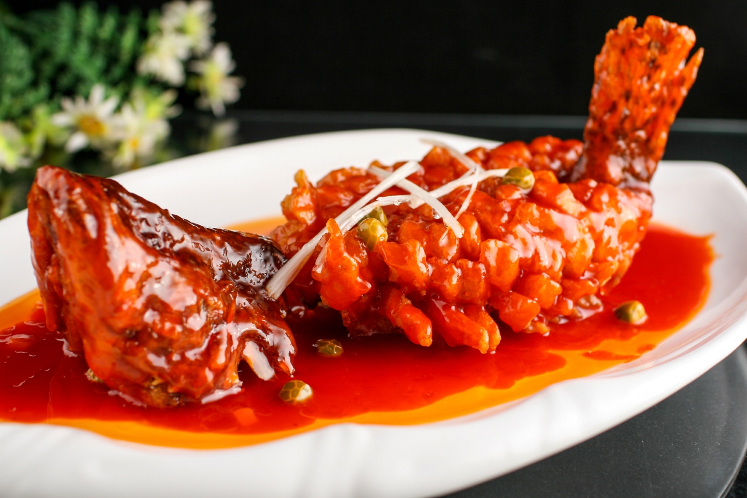 Sweet and Sour Mandarin Fish, renowned for its intricate knife work.