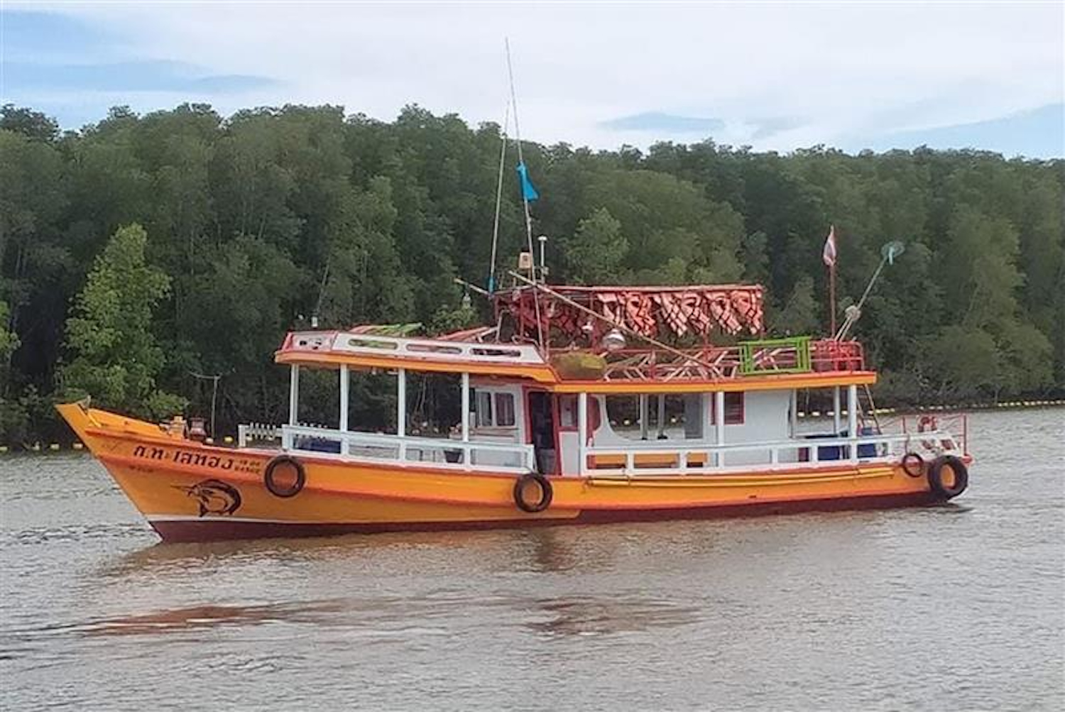 The fishing boat that carried 14 Thai tourists before it sank near Koh Man Wichai off the coast of Pattaya city. (Photo: Amporn Sangkaew)