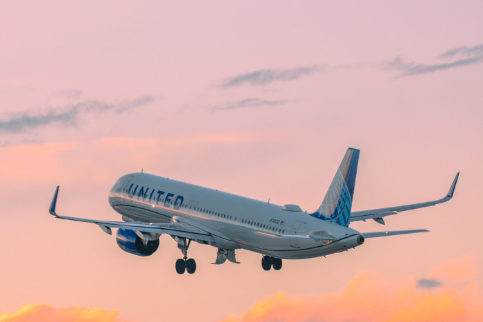 United pilots showered with glass after object struck plane at 36,000 feet