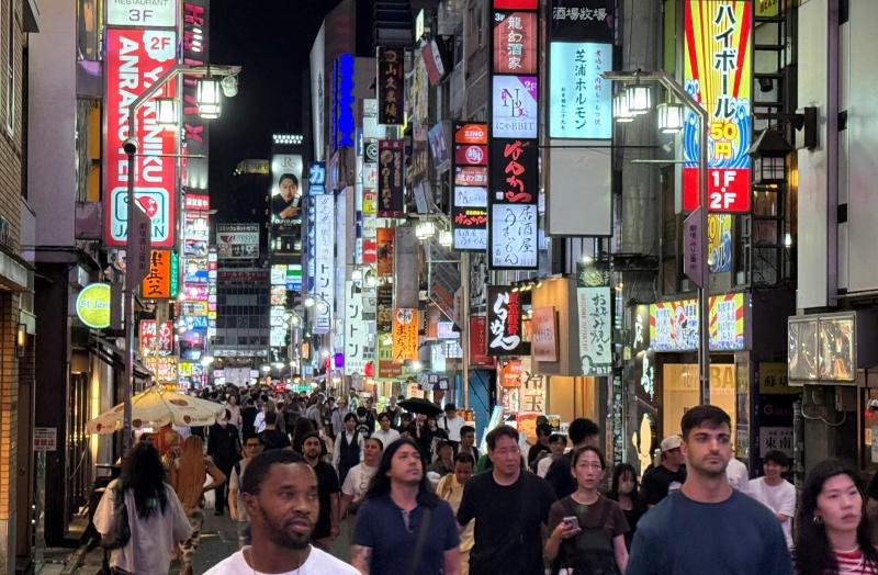 People walk at a shopping area of Shinjuku in Tokyo on Sept 11, 2025. (Photo: Reuters)