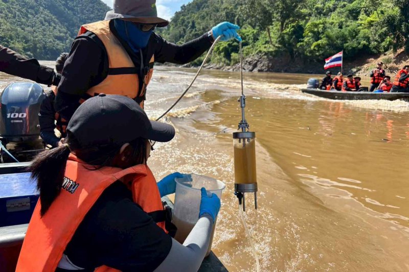Officials collect samples in the Salween River. Photo supplied