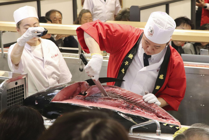 Japanese sushi chain sets Guinness record for largest tuna filleting show