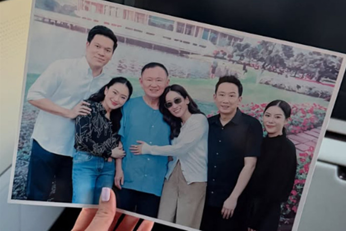 Corrections Department defends family photo during Thaksin prison visit