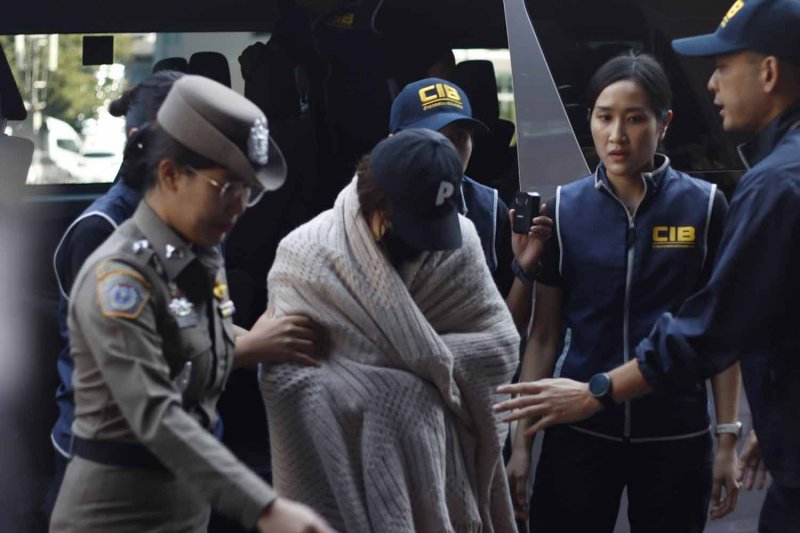 Rybena 'Nana' Intachai is in police custody at the Economic Crime Suppression Division in Bangkok on Wednesday. (Photo: Wassayos Ngamkham)