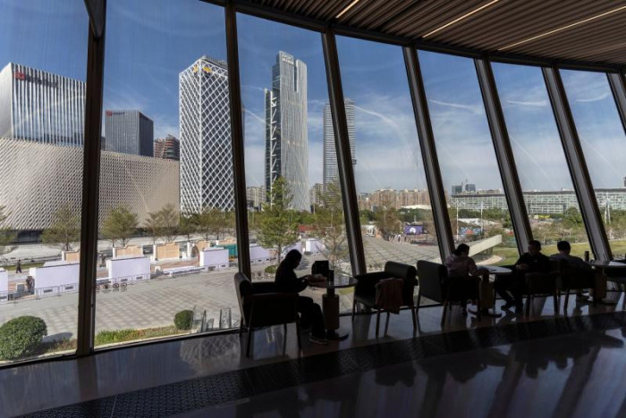 Shenzhen, China's land-starved tech hub, making space by moving massive landfill