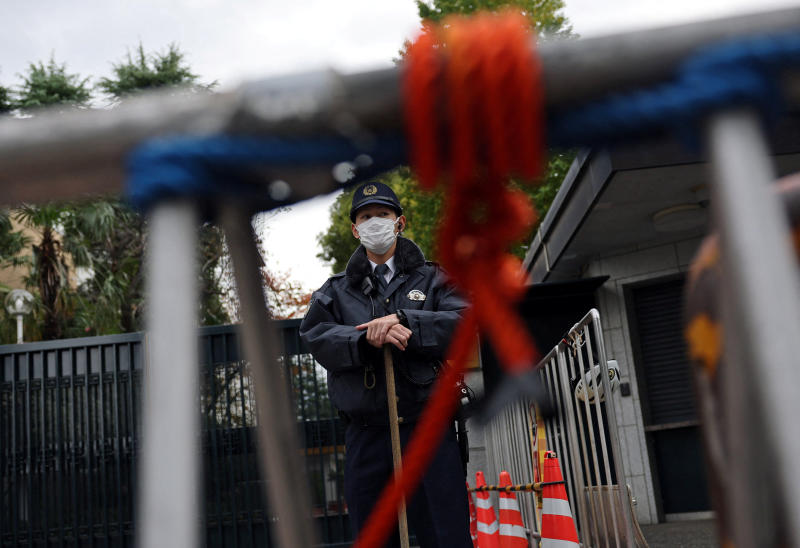 A Japanese police officer stands guard at the entrance of the Chinese embassy in Tokyo, Japan, on Nov 18, 2025. (Photo: Reuters)