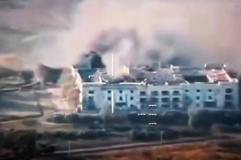 An image shows what is said to be a casino building in Cambodia under attack by a Thai F-16 fighter jet. The building was allegedly used as a military base and armoury by the Cambodian military. (Photo courtesy of Army Military Force Facebook Page)