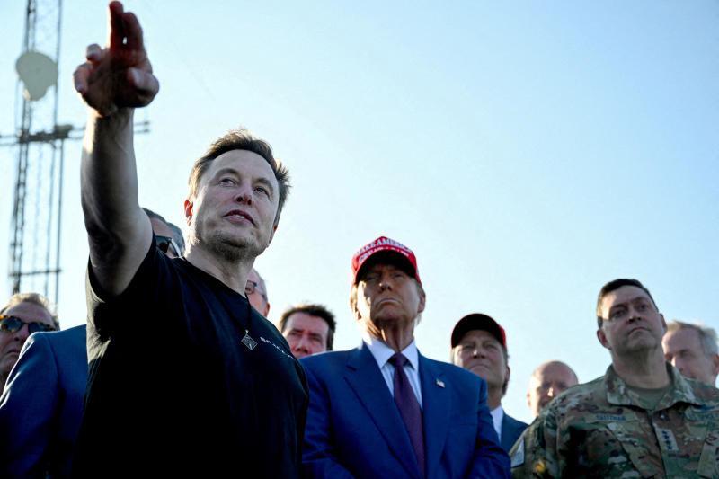 Elon Musk, front left, speaks with US President Donald Trump, centre, and guests at a viewing of the launch of the sixth test flight of the SpaceX Starship, in Brownsville, Texas, the United States, on Nov 19, 2024. (Photo: Reuters)