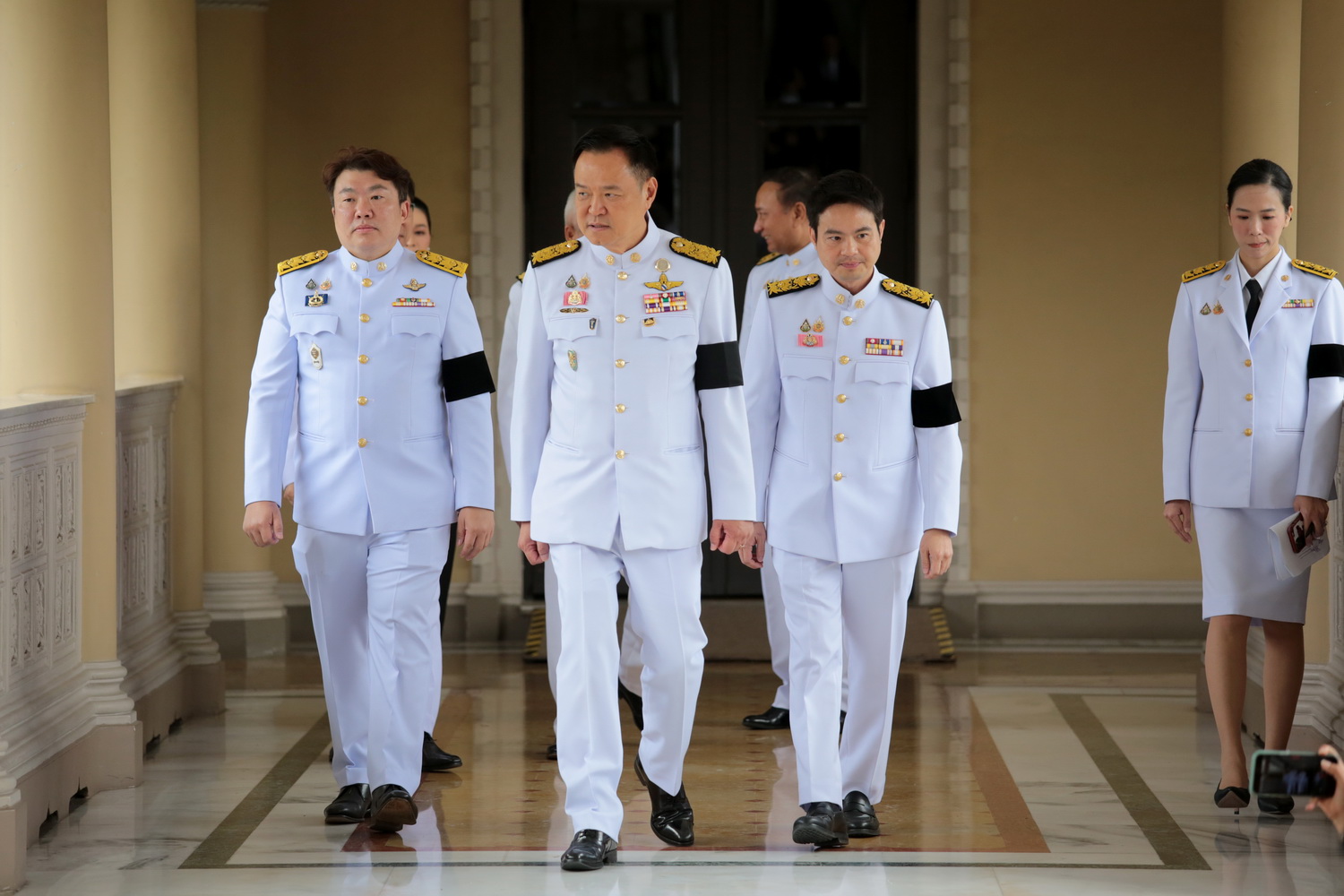 Mr Anutin (centre) has said he is keen to uphold security directives and sustain key economic stimulus measures while serving as caretaker. Chanat Katanyu