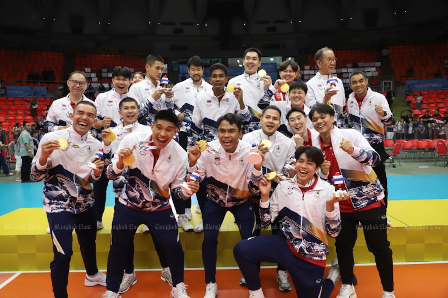 Double delight: The Thai men’s volleyball players pose with their gold medals on the podium. (Photo: Nutthawat Wichieanbut)