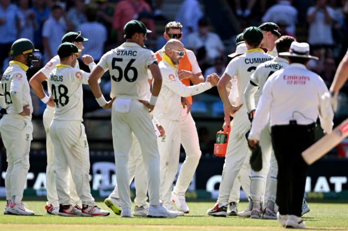 Australia four wickets from Ashes glory as England cling on