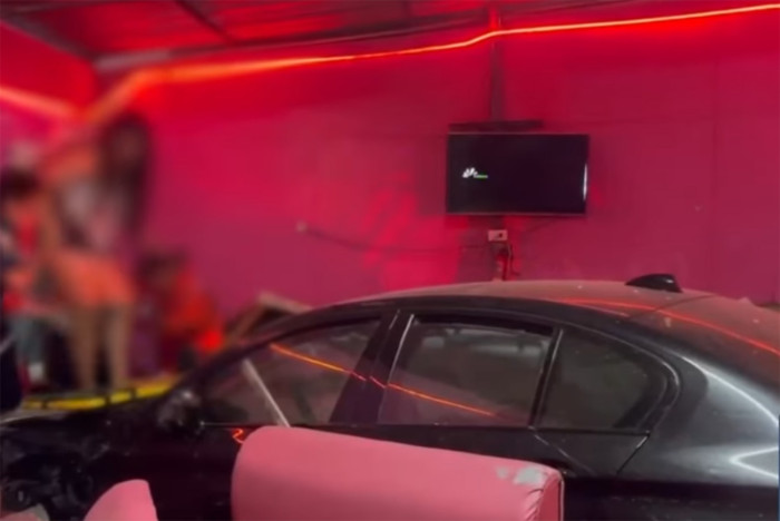 Drunk BMW driver crashes into karaoke bar, injures 8