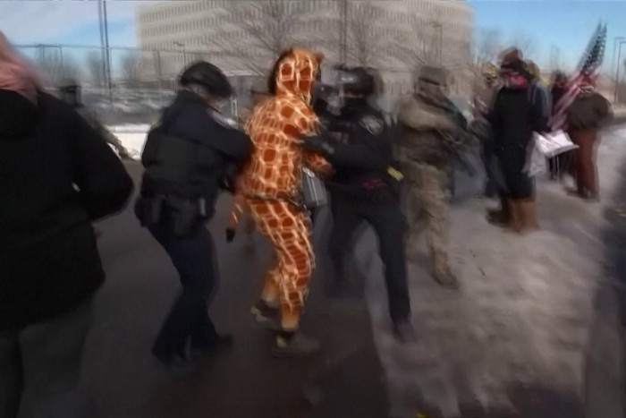 ICE agents arrest protest singer in tense Minneapolis standoff