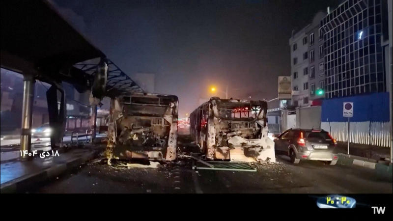Burnt vehicles lie on the road following unrest sparked by dire economic conditions, in a place given as Tehran,&nbsp;Iran, Jan 10, 2026, in this screengrab from&nbsp;Iran's state media broadcast footage. (Photo: Reuters)