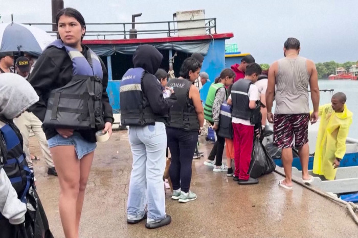 Venezuelans in Panama sail home hoping to find change