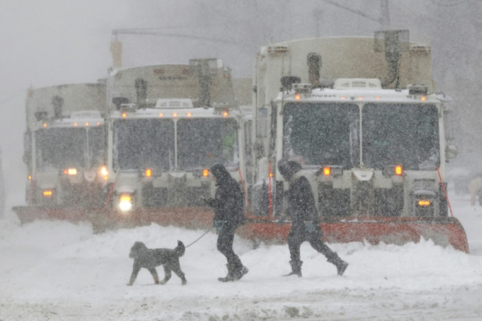 Bitter cold grips millions as US digs out of sweeping snowstorm