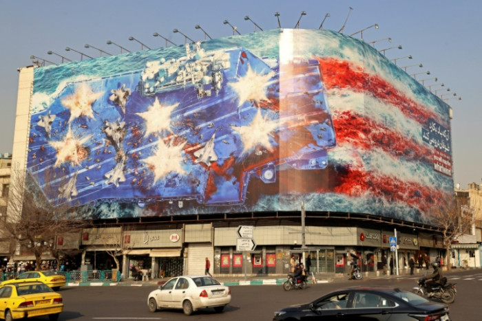 Trump says Iran wants talks as US strike force deploys