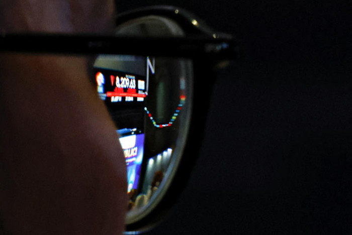 Indonesia stocks tank as downgrade risk triggers capital flight