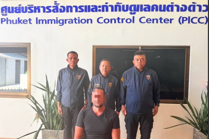 A French national, Mr Wesley, is arrested at a hotel in Thalang district of Phuket on Monday. Immigration authorities have revoked his visa and that of a French woman over their sex show on a tuk-tuk that sparked widespread outrage online. Both have also been blacklisted. (Photo: Achathaya Chuenniran)