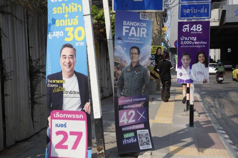 Campaign posters are seen alongside a road in Bangkok. (Photo: Pattarapong Chatpattarasill)