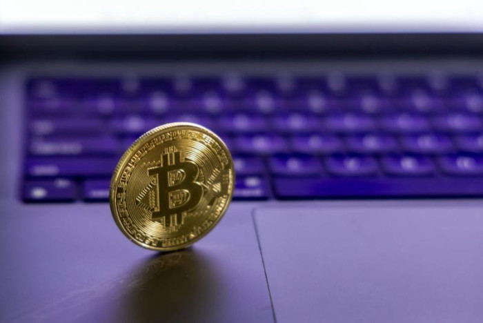 Bitcoin plunges to near $60,000 before paring losses in Asia