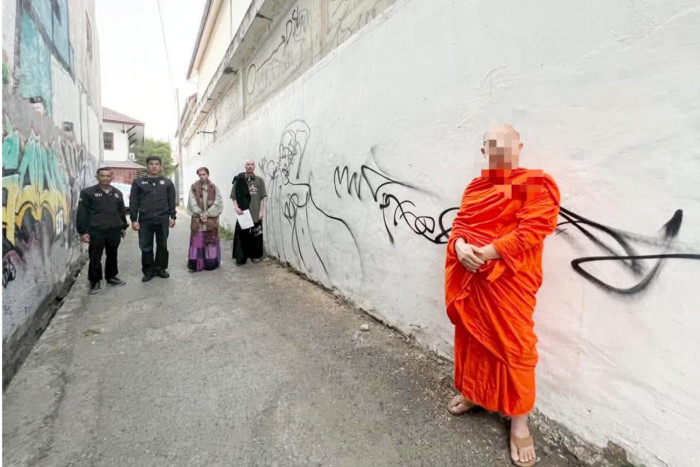 Australians caught spray-painting Chiang Mai temple wall arrested