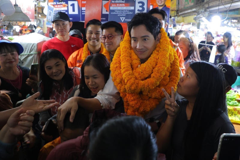 Pita Limjaroenrat, former leader of the now-dissolved Move Forward Party, is surrounded by supporters in Chiang Mai province on Jan 12, 2025. (Photo: People's Party)