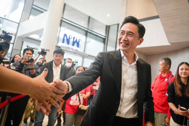 Pheu Thai Party prime ministerial candidate Yodchanan Wongsawat greets supporters at party headquarters, in a photo posted on his Facebook account on Feb 9.