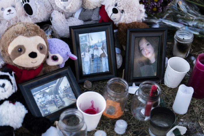 Canada PM to mourn with grieving town, new details on shooter emerge