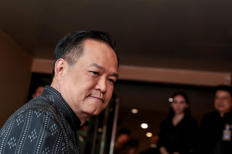 Caretaker Prime Minister and Bhumjaithai Party leader Anutin Charnvirakul enters a cabinet meeting at Government House last week. (Photo: Reuters)