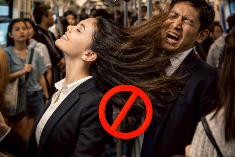 The BTS Skytrain has called on passengers to refrain from flicking or tossing their hair while travelling during peak hours. (Photo: BTSSkyTrain)