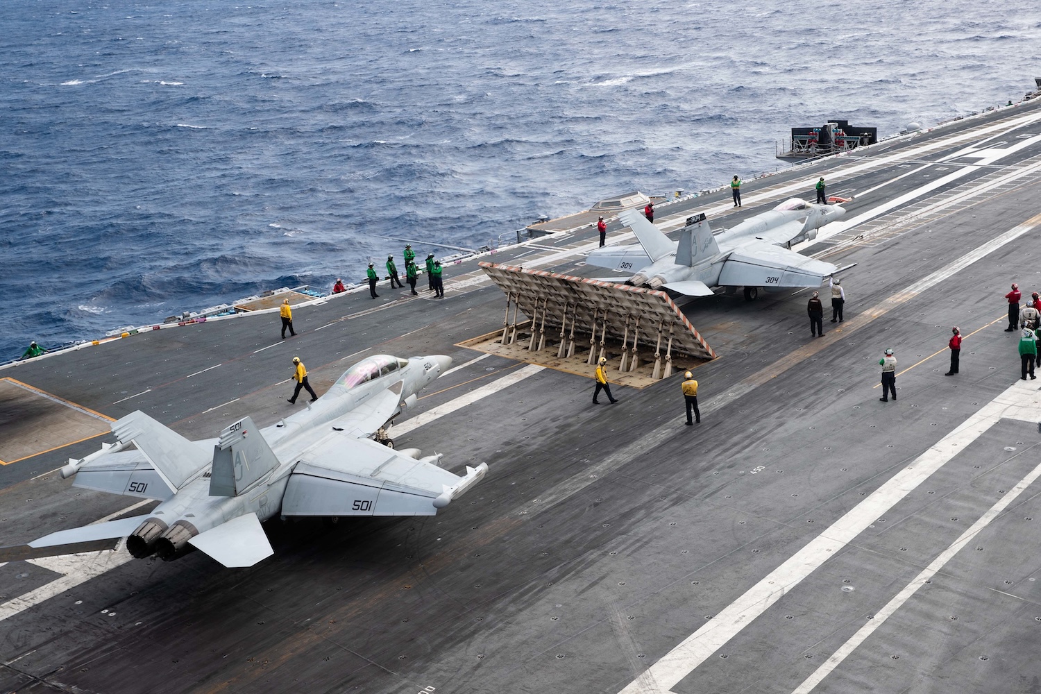 Fighter jets prepare to launch from the deck of the USS Gerald R Ford. The Navy’s newest aircraft carrier has had mechanical problems throughout its eight-month deployment, but officials now say it is ready for battle. (PhotoL US Navy via The New York Times)
