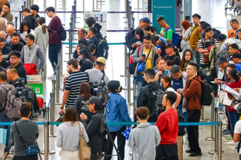 Travellers stranded at Hong Kong airport as at least 27 Middle East flights disrupted