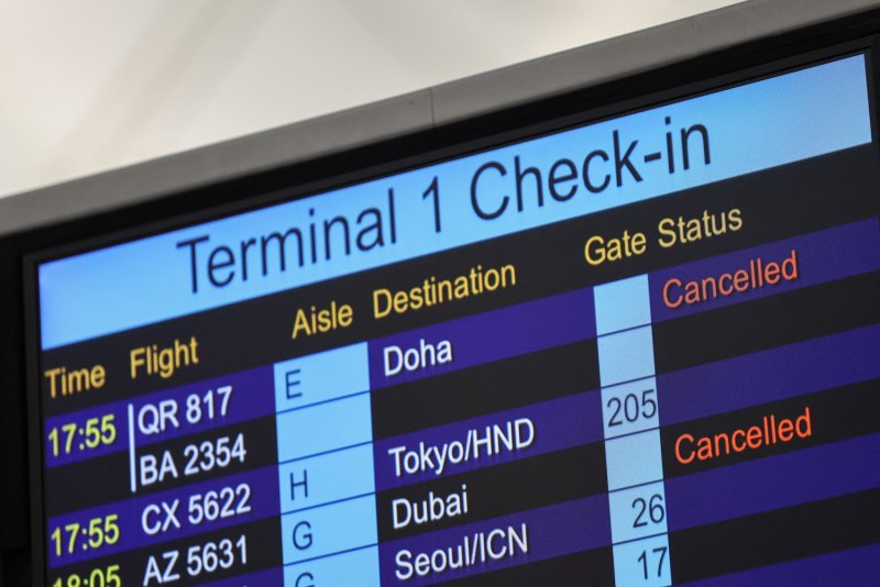 A screen displays cancelled flights to Middle East destinations at Hong Kong International Airport on March 2, 2026. (Photo: Reuters)