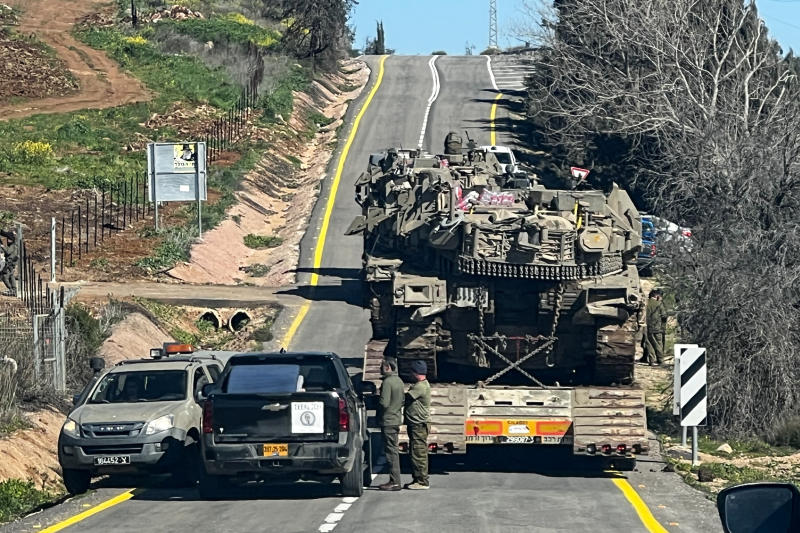 Israeli military vehicles on a road on the Israeli side of the Israel-Lebanon border, amid an escalation between Iran-backed Hezbollah and Israel, and amid the US-Israeli conflict with Iran, in northern Israel on Thursday. (Photo: Reuters)