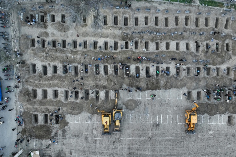 Graves are dug for children reportedly killed in a school strike in Minab, an image from the Iranian Press Centre shows. (Photo: AFP)