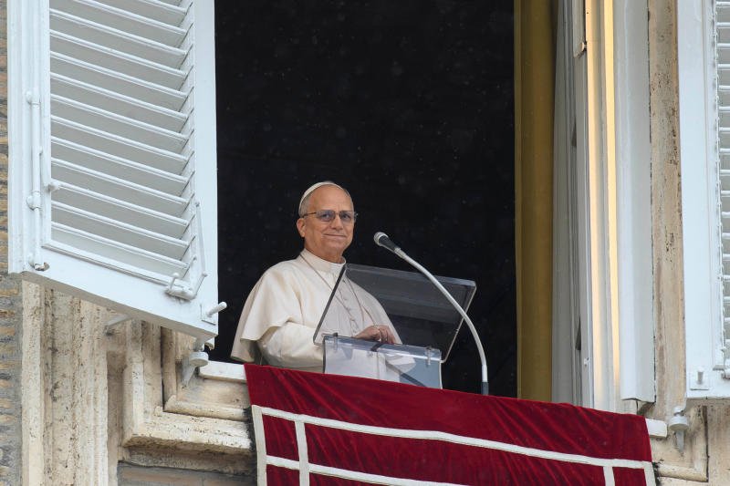 Pope Leo XIV reacts as he leads the Angelus prayer from a window of the Apostolic Palace, at the Vatican, on Sunday. (Photo: Reuters)