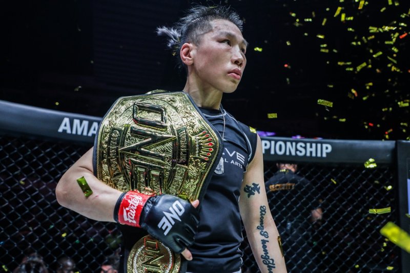 Xiong Jingnan with the ONE Championship strawweight MMA world title