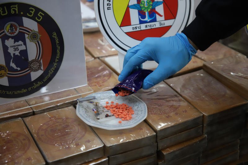 During a press briefing at the Bangkok-based Narcotics Suppression Bureau, meth tablets are presented as evidence from drug situations, including meth medications. ( Photo: Varuth Hirunyatheb)