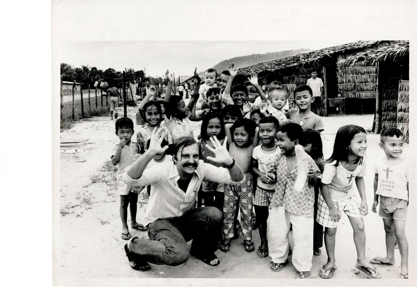 Denis Gray in 1975 with refugee children along the Thai-Cambodian border in Trat. Photos courtesy of DENIS GRAY