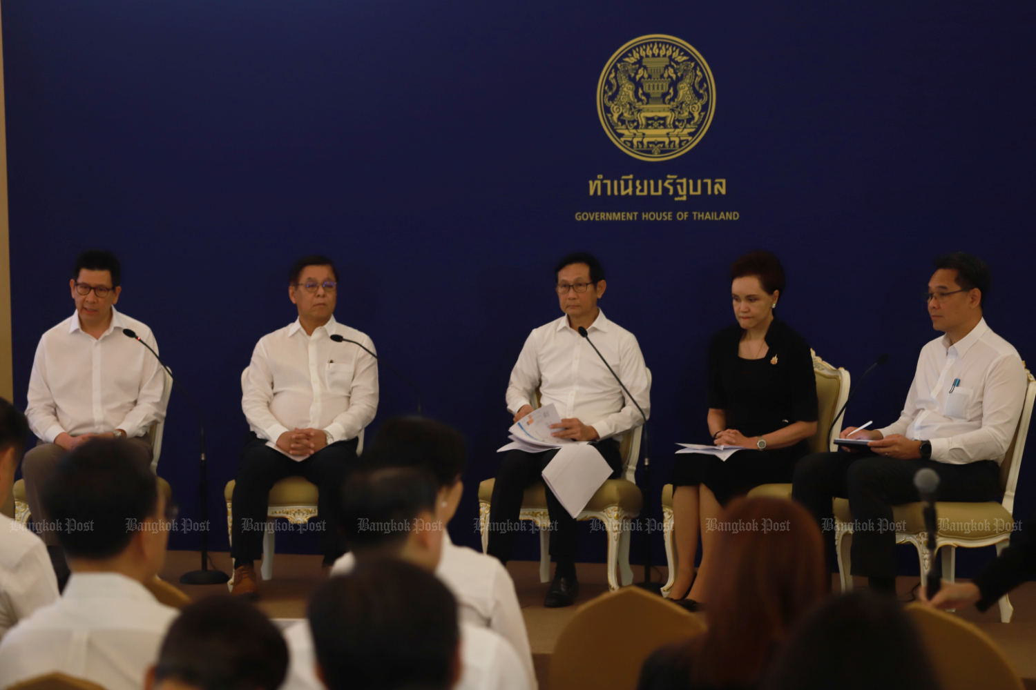 From left: Finance Minister Ekniti Nitithanprapas, Foreign Affairs Minister Sihasak Phuangketkeow, Energy Minister Auttapol Rerkpiboon, Commerce Minister Suphajee Suthumpun and Danucha Pichayanan, secretary-general of the National Economic and Social Development Council attend a session during the press conference at Government House on Saturday.