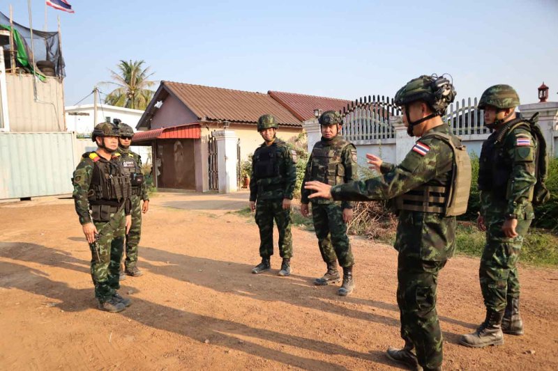 Senior army officers inspect an area in Sa Kaeo province bordering Cambodia on Friday. Photo: First Army Area
