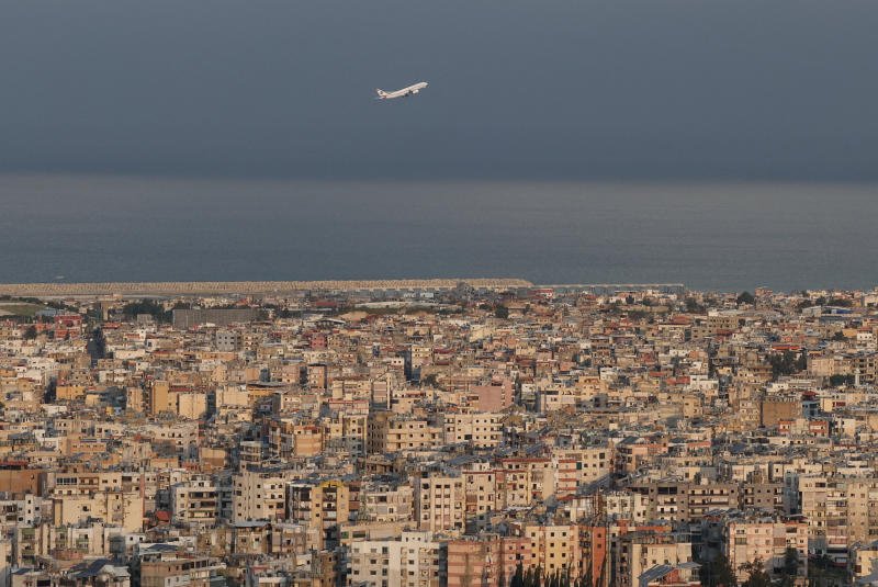 A Lebanese Middle East Airlines (MEA) aircraft takes off from the Beirut-Rafic Hariri International Airport, as the Beirut's southern suburbs is seen, amid escalating hostilities between Israel and Hezbollah, as the US-Israeli conflict with Iran continues, Lebanon, on March 25, 2026. (Photo: Reuters)