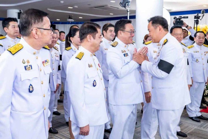 Bhumjaithai Party leader Anutin Charnvirakul (right) greets Pheu Thai leader Julapun Amornvivat after he received the royal command appointing him Thailand’s 32nd prime minister, before the formation of his cabinet, at Bhumjaithai headquarters in Bangkok on March 20, 2026. (Photo: Chanat Katanyu)