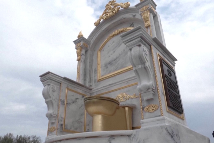 'A throne fit for a king': DC golden toilet sculpture mocks Trump