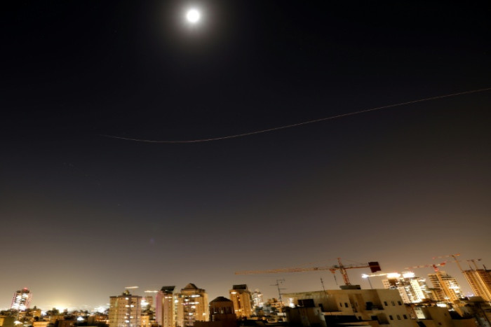 Iran fires missiles across Middle East as Trump threatens oil hub