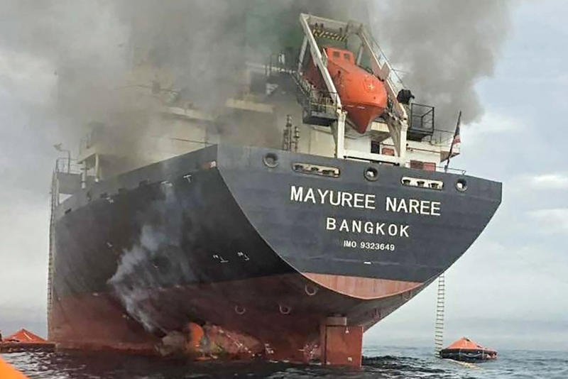 Smoke pours from the Thai-flagged bulk carrier Mayuree Naree after two projectiles struck the hull above the waterline on March 11, 2026. (Photo: Precious Shipping Plc)